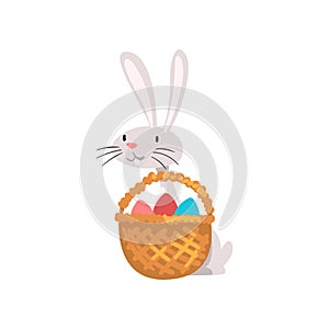 Cute White Easter Bunny with Basket of Colorful Eggs, Adorable Rabbit Cartoon Character Vector Illustration