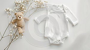 a cute white onesie mock-up set against a pristine white background, adorned with a cuddly teddy bear for added