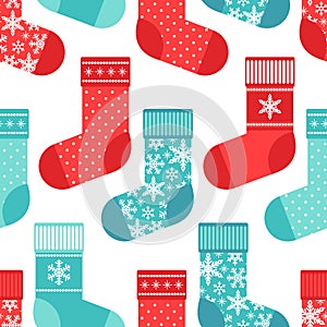 Cute winter seamless pattern with socks in traditional colors