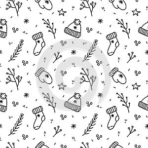 Cute winter seamless pattern with warm hats, mittens, socks, spruce twigs and branches with berries
