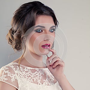 Cute Woman Fiancee with Bridal Hairstyle and Makeup