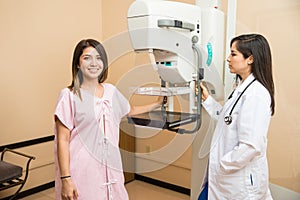 Cute woman getting a mammography