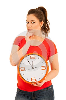 Cute woman holding a clock as a simbol of time management