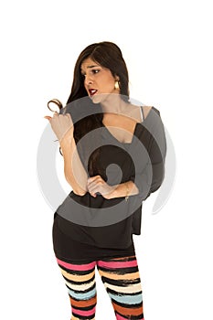 Cute woman looking at her hair split ends frustrated