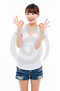 Cute woman with okay hand gesture