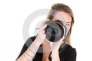 Cute woman photographer taking photos with dslr camera photography