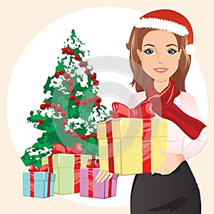 Cute woman in the red hat holding a gift in hands on the background of a Christmas tree and gifts