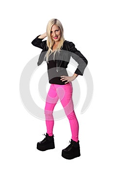 Cute woman in tophat and pink pants