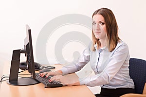 Cute woman working in computer in the office