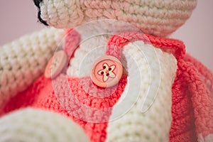 Cute wool dolls are lying on the table