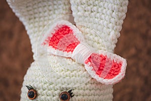 Cute wool dolls are lying on the table