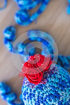 Cute wool dolls are lying on the table