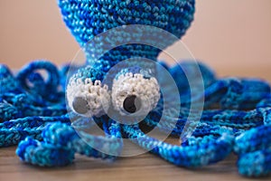 Cute wool dolls are lying on the table