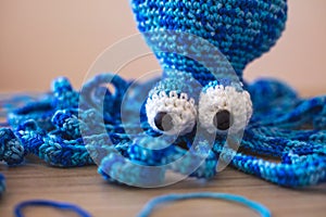 Cute wool dolls are lying on the table