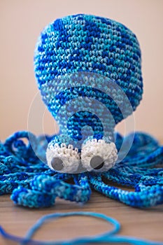 Cute wool dolls are lying on the table