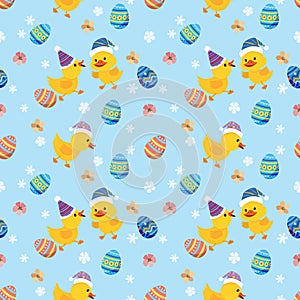 Cute yellow duckling with Easter egg and flowers on blue background seamless pattern.