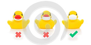 Cute yellow rubber ducks in face masks on white background