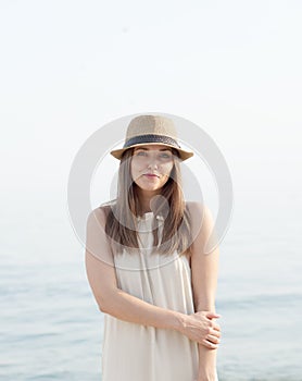 Cute youg calm woman portrait near sea