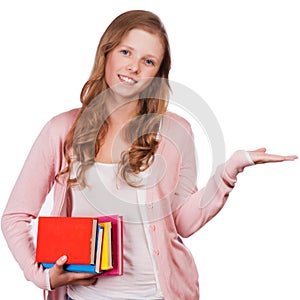 Cute young attractive student girl holding colorful exercise books.