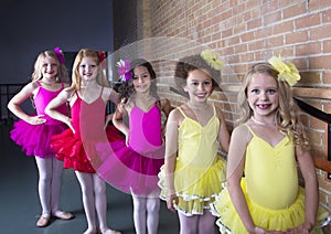 Cute young ballerinas at a dance studio