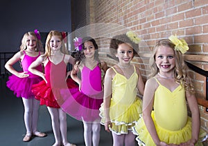Cute young ballerinas at a dance studio photo