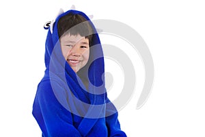 Cute young boy with great smile in bath robe