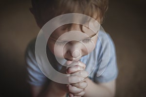 Cute Young Boy Praying