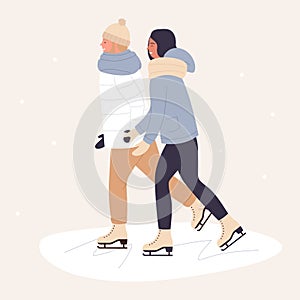 Cute young couple skating together in winter