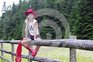 Cute young cowgirl portrait photo