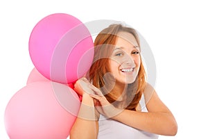 Cute young girl with balloons