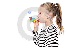 Cute young girl making special exercises at speech therapy office. Child speech therapy concept on white background. photo