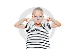 Cute young girl making special exercises at speech therapy office. Child speech therapy concept on white background.