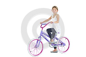 Cute young girl riding bike