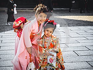 Japanese girls smiling wearing Japanese Kimono in Kyoto Japan