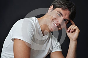 Cute young man smiling