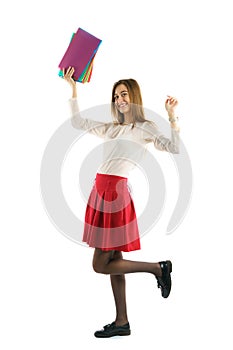 Cute young student girl with folders