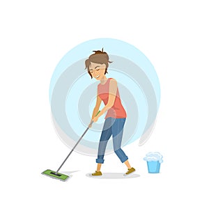 Cute young woman cleaning mopping floor, household chores