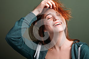 Cute young woman fun happiness messing hair