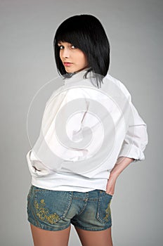 Cute young woman in mens shirt