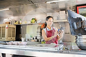 Swiping credit card in a food truck photo