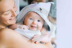 Cutest baby after bath with towel on head.