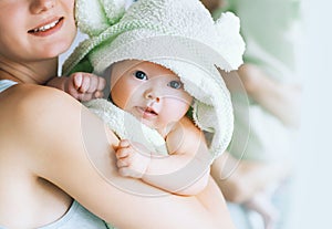 Cutest baby after bath with towel on head.