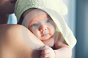 Cutest baby after bath with towel on head.