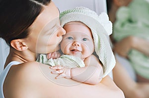 Cutest baby after bath with towel on head.