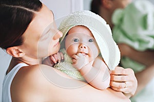 Cutest baby after bath with towel on head.