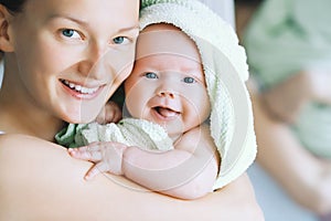 Cutest baby after bath with towel on head.