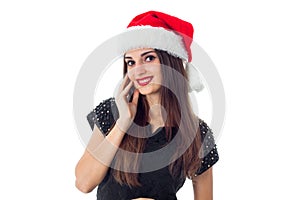 Cutie brunette girl in santa hat