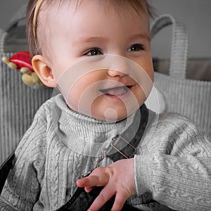 Cutie little baby girl smiles at home