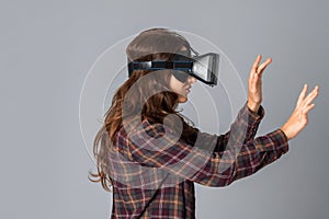 Cutie woman testing virtual reality helmet