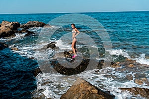 Cutie young girl having fun in sea